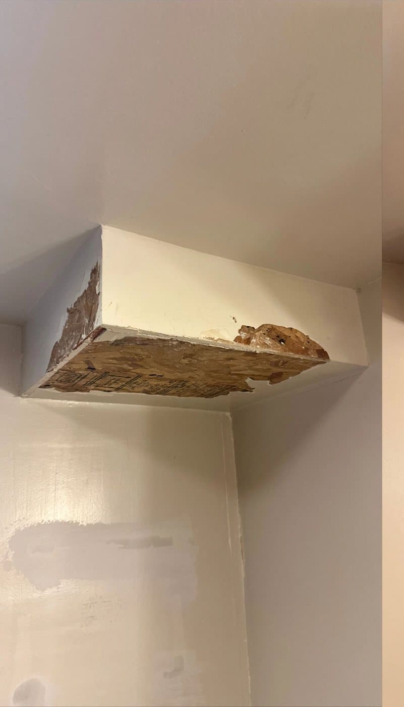 Before: A ceiling box with rotted board exposed, then rebuilt and painted